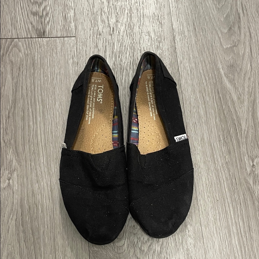 TOMS Black Canvas Slip-Ons